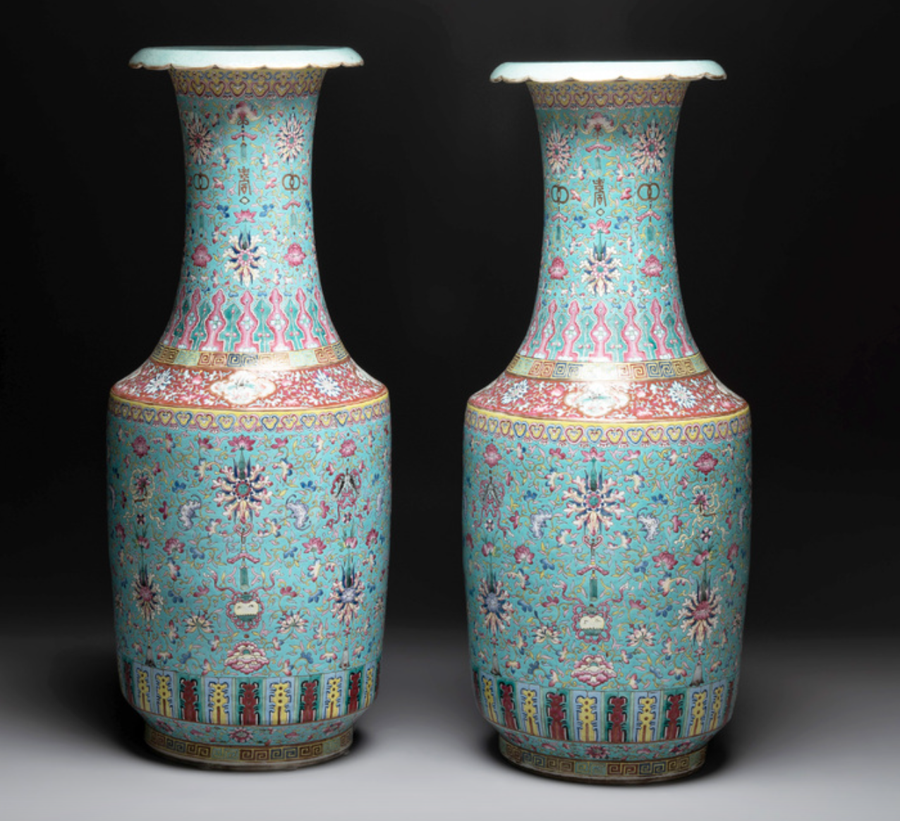A pair of Chinese famille rose vases